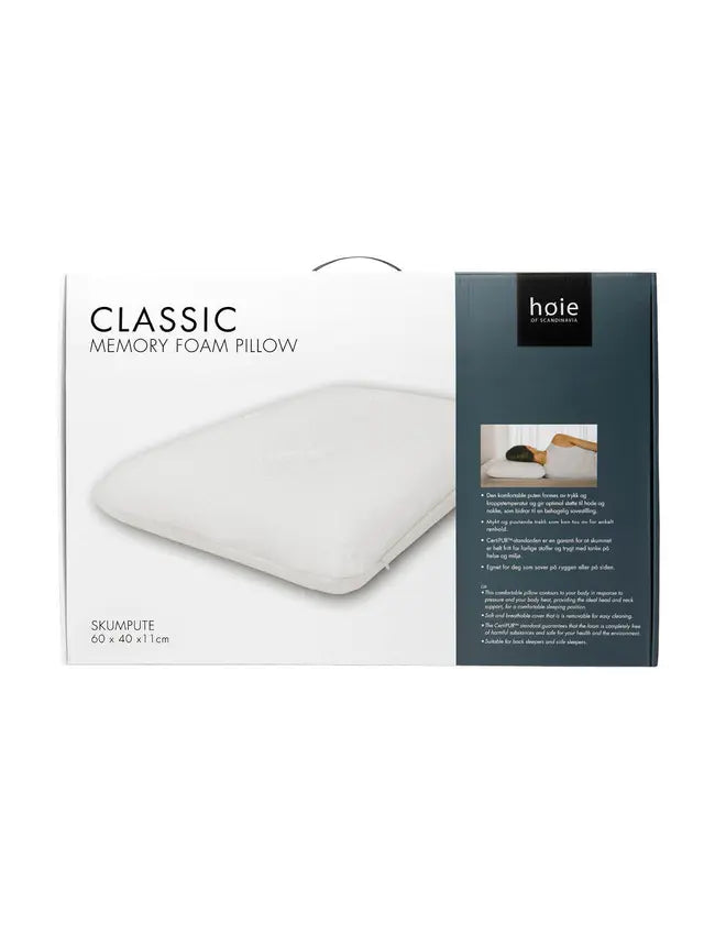 Høie Classic Memory Foam Pillow -tyynyn valkoinen ja tummansininen tuotepakkaus.