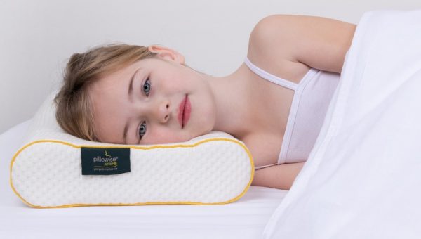 Chils sleeping on a pillow