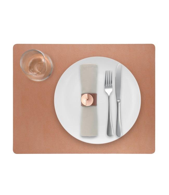 Cognac brown rectangular Finesse placemat with a white plate, cutlery and glass viewed from above