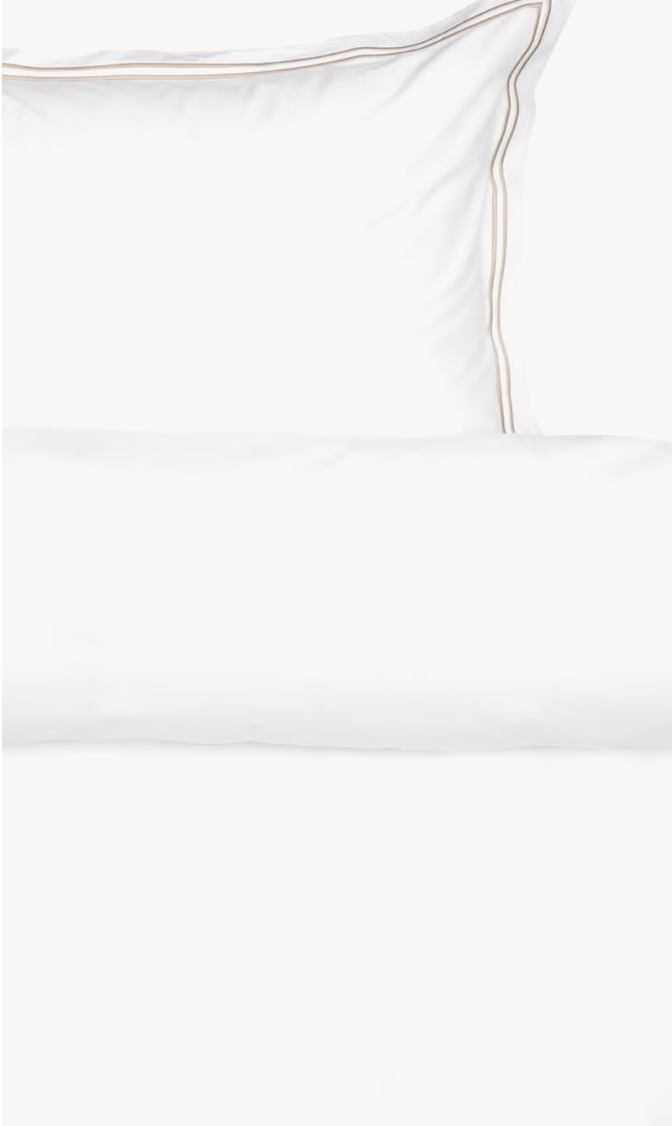 White Høie Paris pillowcase and turned-down top edge of the duvet cover