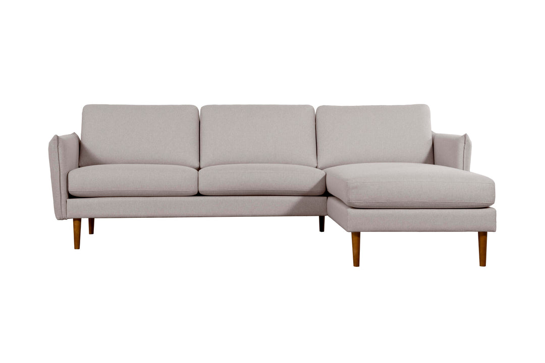 Light grey Hotel Luxus Elegant chaise sofa with wooden legs and the chaise on the right in the image
