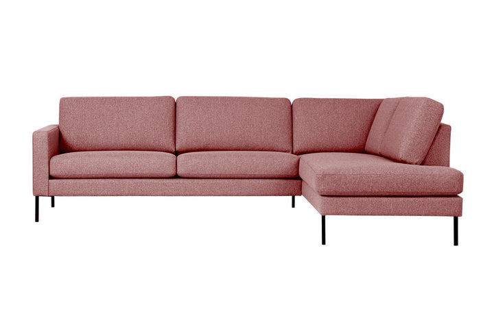 Pink Hotel Luxus Elegant chaise sofa with black legs and the chaise on the right in the image