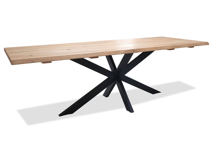 Långt ljust träbord med förgrenade stöd på ett svart Star Base-stjärnunderrede