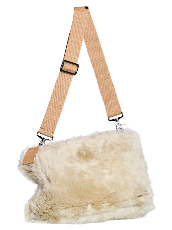 Light KYWIE Stone sheepswool bag with a brown adjustable shoulder strap