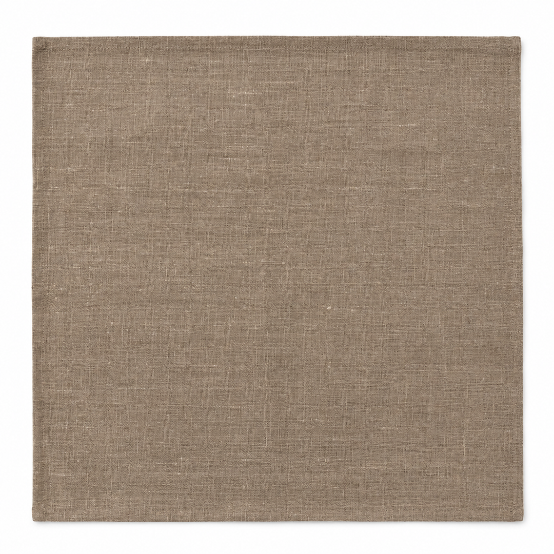 Dark No Problem Luxus linen napkin unfolded on a white background, showing its square shape and hemmed edges.