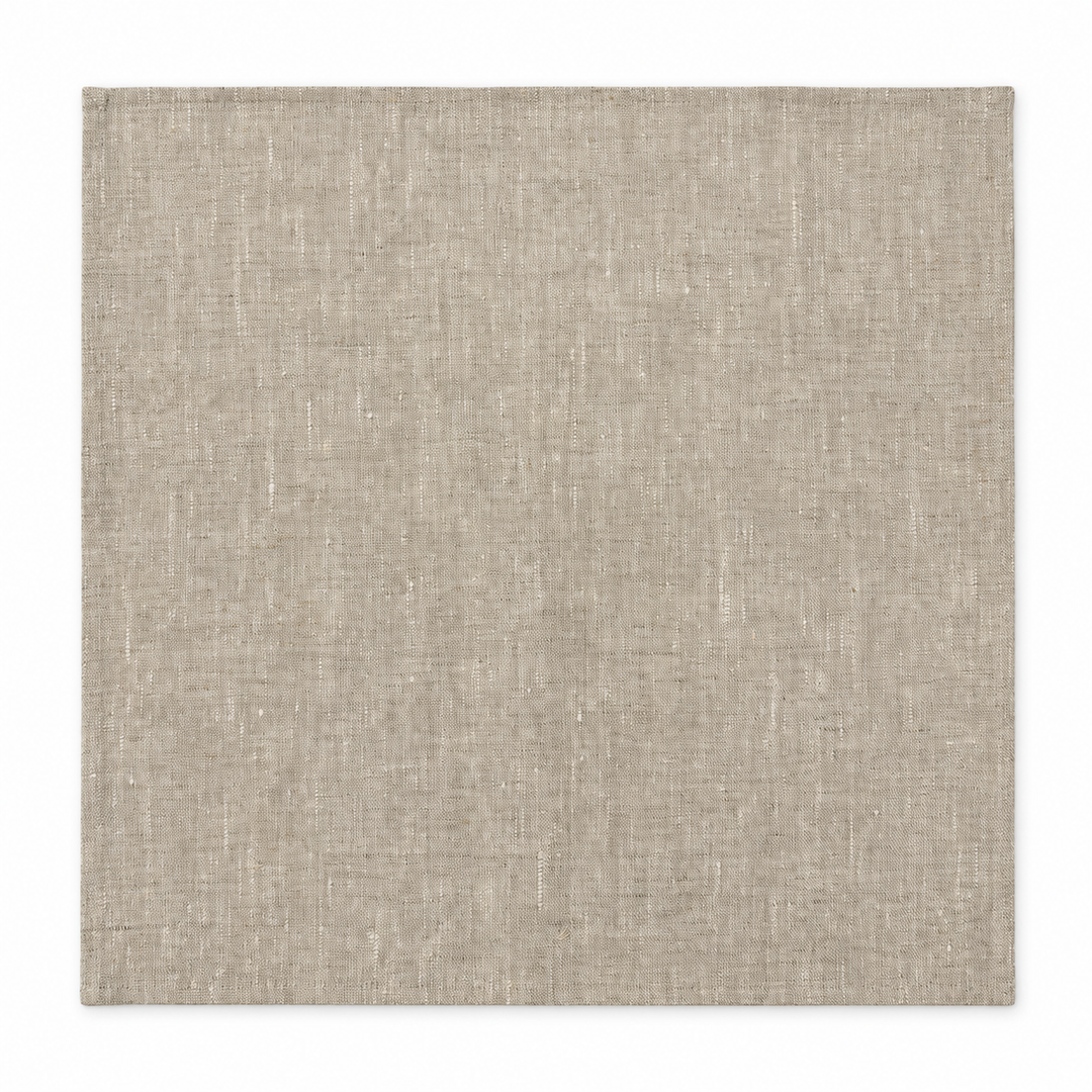Light No Problem Luxus linen napkin unfolded on a white background, showing its square shape and hemmed edges.